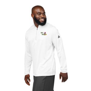 A man wearing an Adidas Embroidered Quarter-Zip Pullover with "Men's Health" text and logo on the left chest stands looking to the side.