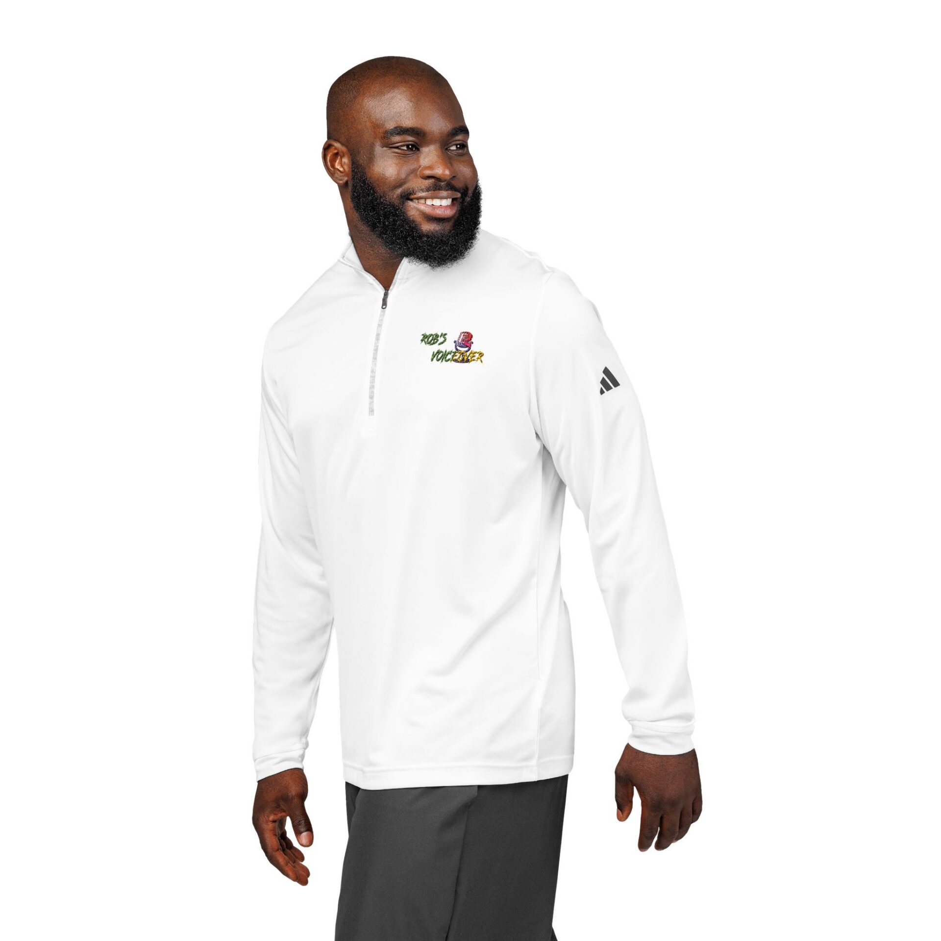 A man wearing an Adidas Embroidered Quarter-Zip Pullover with "Men's Health" text and logo on the left chest stands looking to the side.