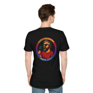 A person wearing a black T-shirt with a colorful graphic on the back featuring a man with a beard holding a microphone and the text "Rob's Voiceover Since 2017.